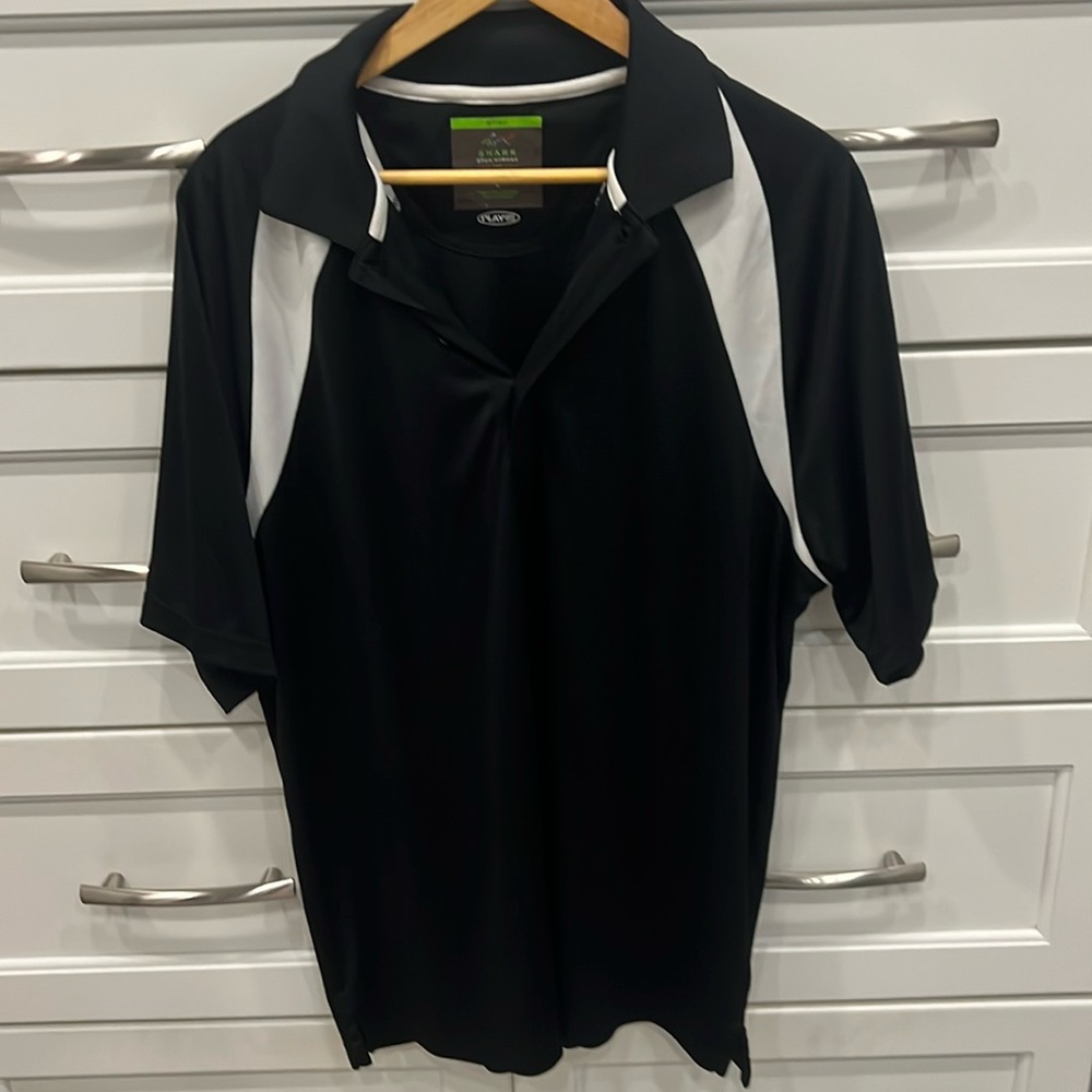 Men’s Greg Norman golf shirt. Size Large. Black & White